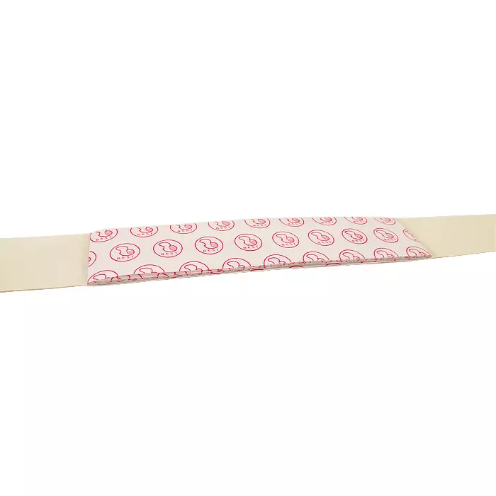 Stack of 10 pre-cut adhesive carry handle strips with release liner, showing ready-to-use packaging handles.